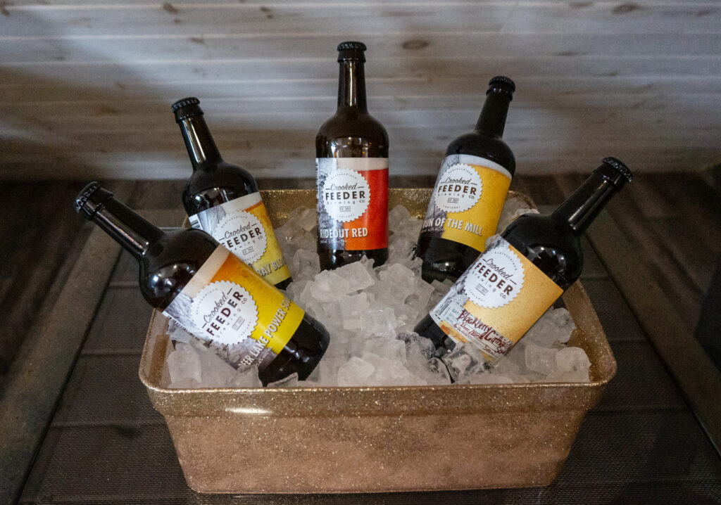 Bottles of beer from Crooked Feeder Brewing.